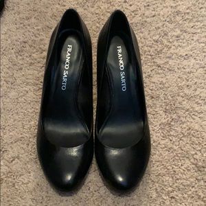 Never worn! Black round toe wedge.